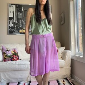 Sheer bermuda shorts with pleats